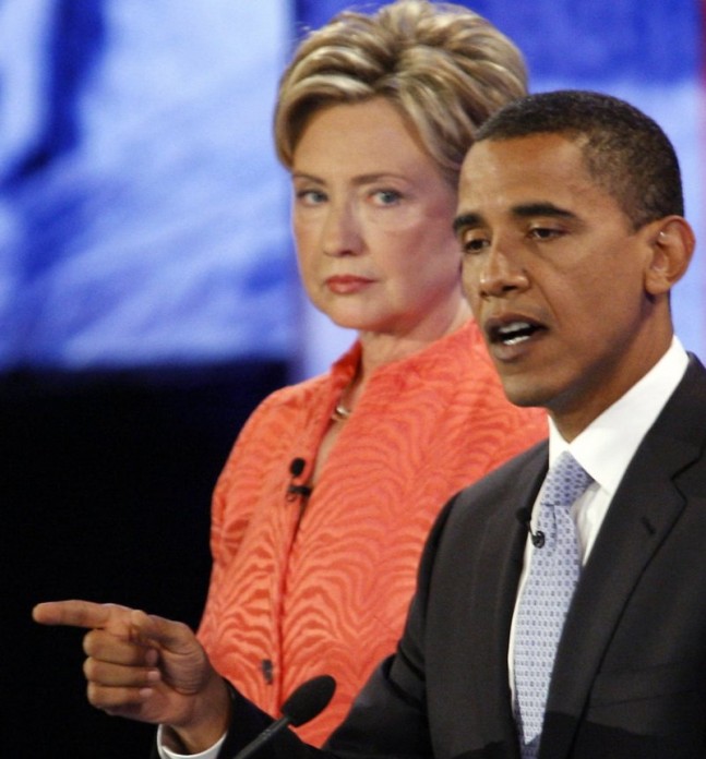 New York Senator Hillary Clinton (L) lis