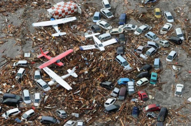 2011-march-11-japan-earthquake-sendai-airport-cars-planes-700x466