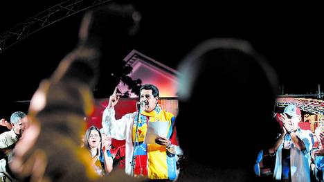 Nicolas-Maduro-oficialismo-MUD-AFP_CLAIMA20131210_0001_17