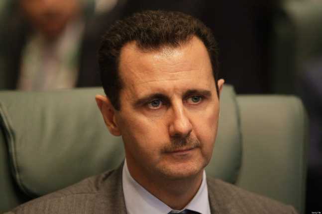 Syrian President Bashar al-Assad attends