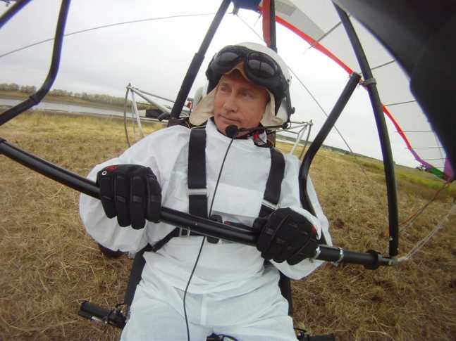 he-also-attempted-to-help-endangered-siberian-cranes-begin-their-migration-routes-by-assisting-them-with-a-motorized-hang-glider